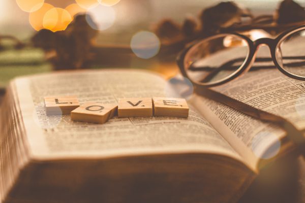 LOVE Scrabble letters on bible