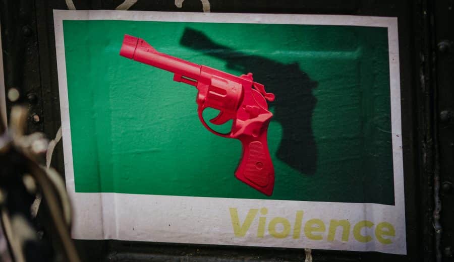 Red pistol on green and white background