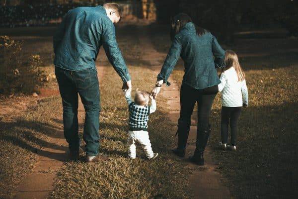 Family walking on a path