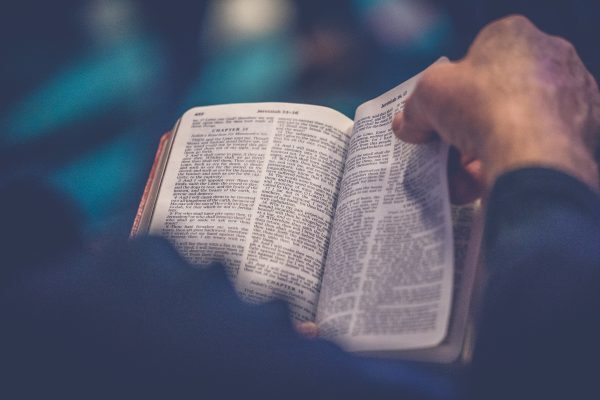 Flipping the page of a Bible
